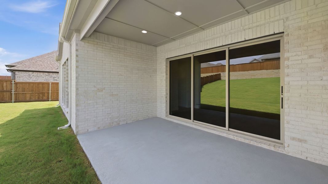 Exterior details and patio area of a home in Lakewood Village, Lakewood Village (Image 4). Exterior details and patio area of a home in Lakewood Village, Lakewood Village (Image 4).