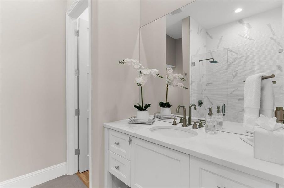 Ensuite guest bath on first floor. Ensuite guest bath on first floor.