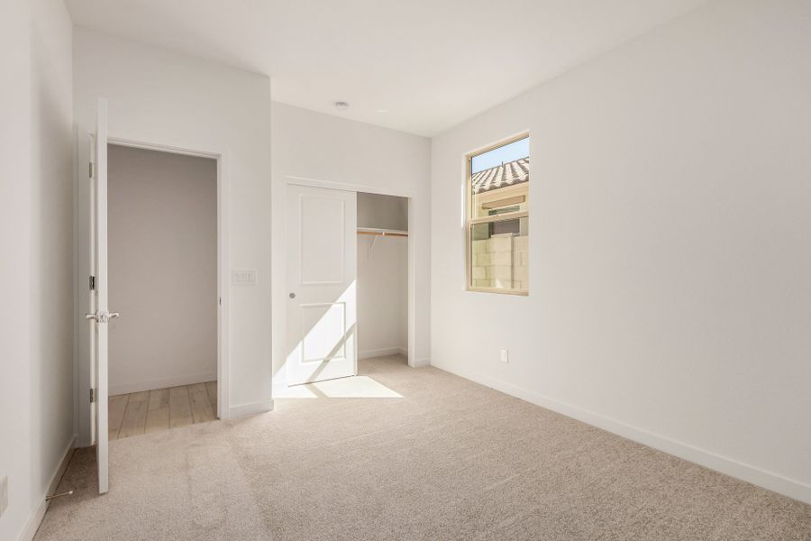 Spacious, unfurnished interior of a new home in The Villages at North Copper Canyon, Surprise (Image 10).