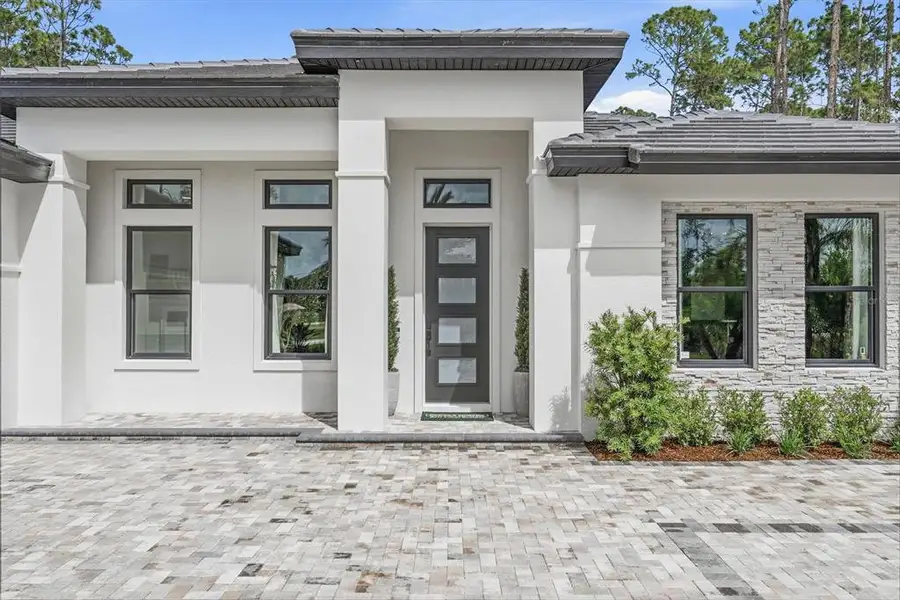 Exterior details and patio area of a home in , Ormond Beach (Image 3).
