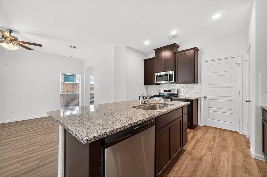Furnished interior view inside a new home in Mill Creek Trails, Magnolia (Image 10).