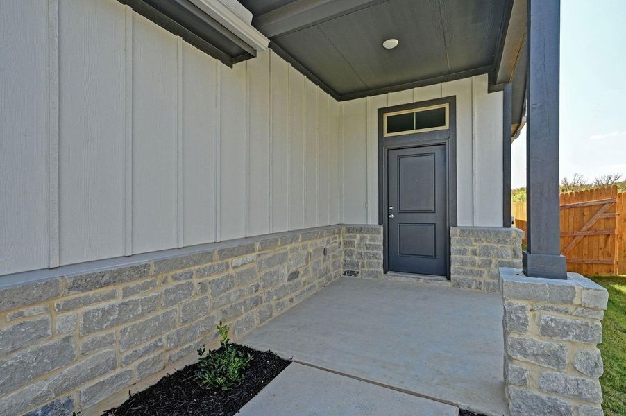 Exterior details and patio area of a home in Trinity Ranch, Elgin (Image 18).