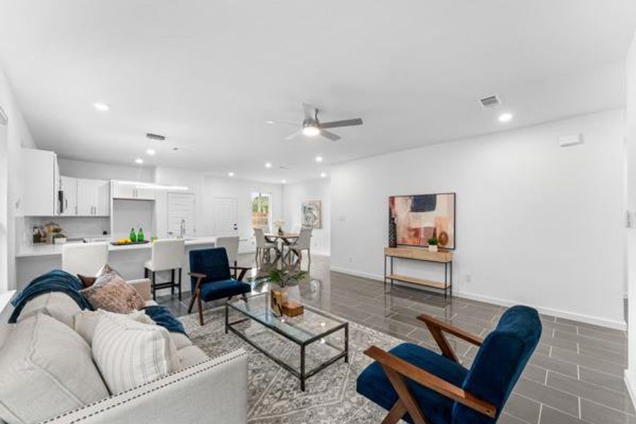 Living room with recessed lighting and ceiling fan Living room with recessed lighting and ceiling fan
