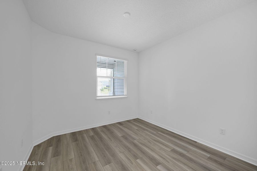 Spacious, unfurnished interior of a new home in Del Webb Wildlight, Yulee (Image 21).