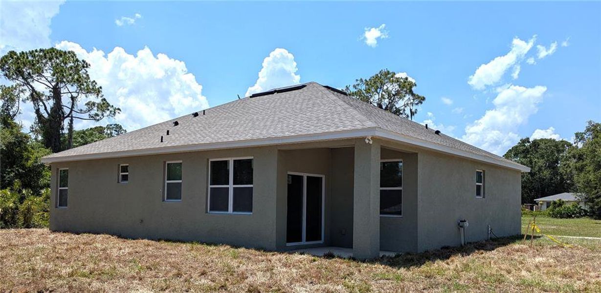 Exterior details and patio area of a home in , Sebring (Image 3).