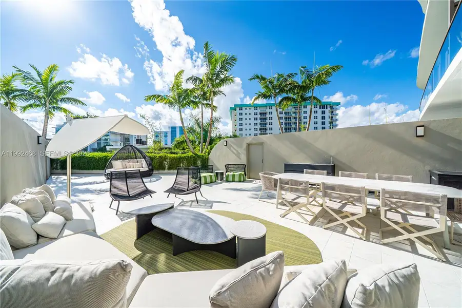 Exterior details and patio area of a home in , Bay Harbor Islands (Image 23).
