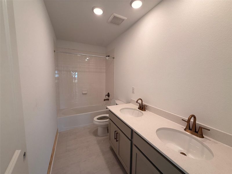 Furnished interior view inside a new home in Wildrye, Waller (Image 4).