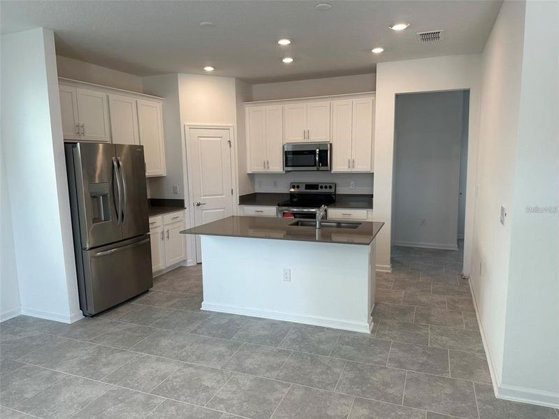 Furnished interior view inside a new home in Wellness Ridge: Cottage Collection, Clermont (Image 5). Furnished interior view inside a new home in Wellness Ridge: Cottage Collection, Clermont (Image 5).