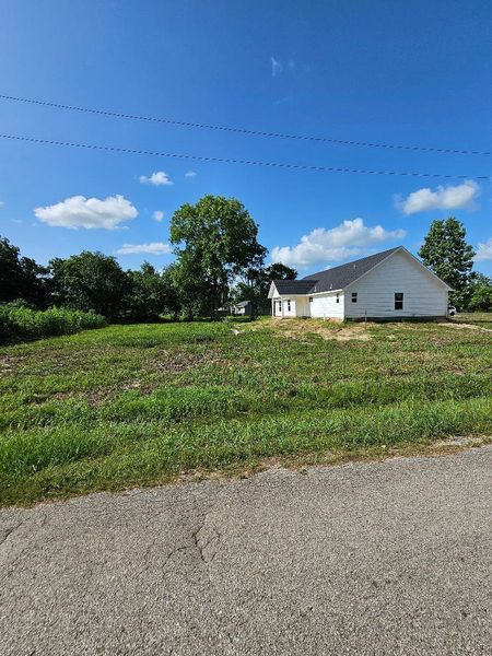 Front exterior of a new home in , Dayton, TX, highlighting curb appeal (Image 2).