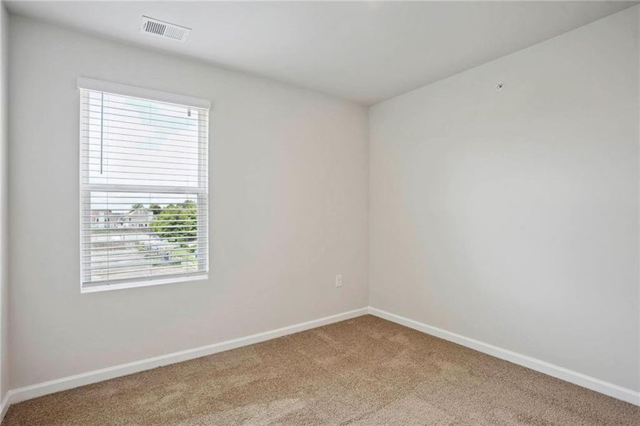Spacious, unfurnished interior of a new home in The Enclave Townhomes, Hampton (Image 13).