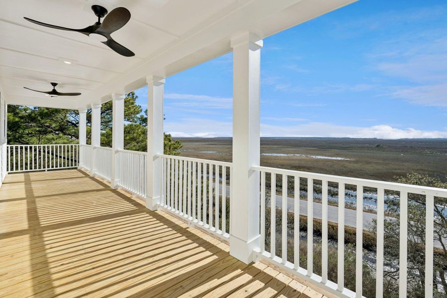 Exterior details and patio area of a home in Overlook at Copahee Sound, Awendaw (Image 31).