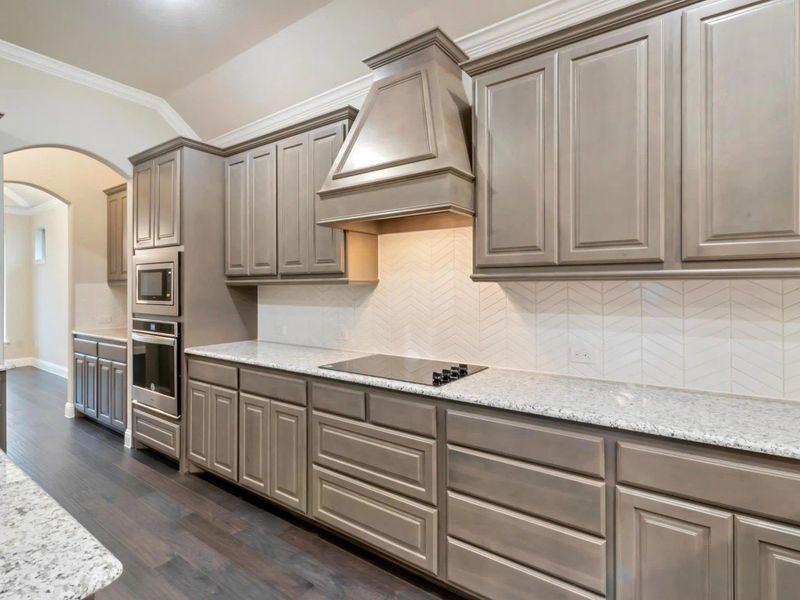 Kitchen | Concept 2533 at Mockingbird Hills in Joshua, TX by Landsea Homes