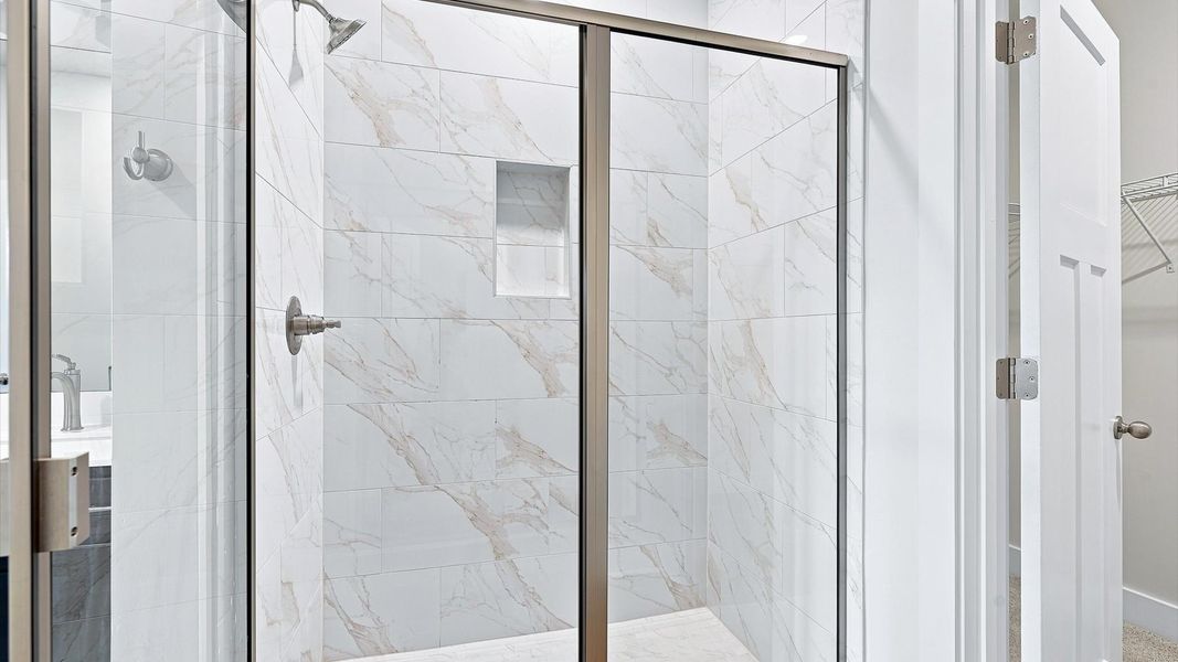 Private bath sanctuary featuring upscale materials, thoughtful design, and a walk-in shower near Lake Hartwell