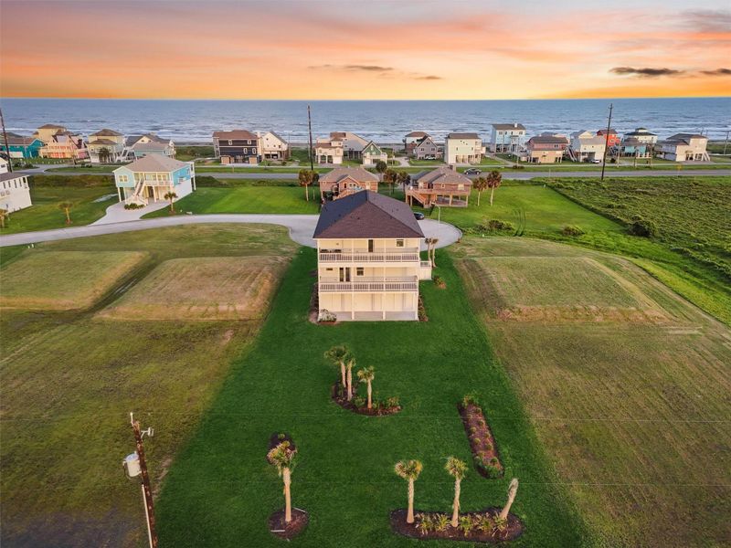 Aerial view showcasing the home’s premium lot—no back neighbors and sweeping views of the bay, wetlands, and Texas coastline. Aerial view showcasing the home’s premium lot—no back neighbors and sweeping views of the bay, wetlands, and Texas coastline.