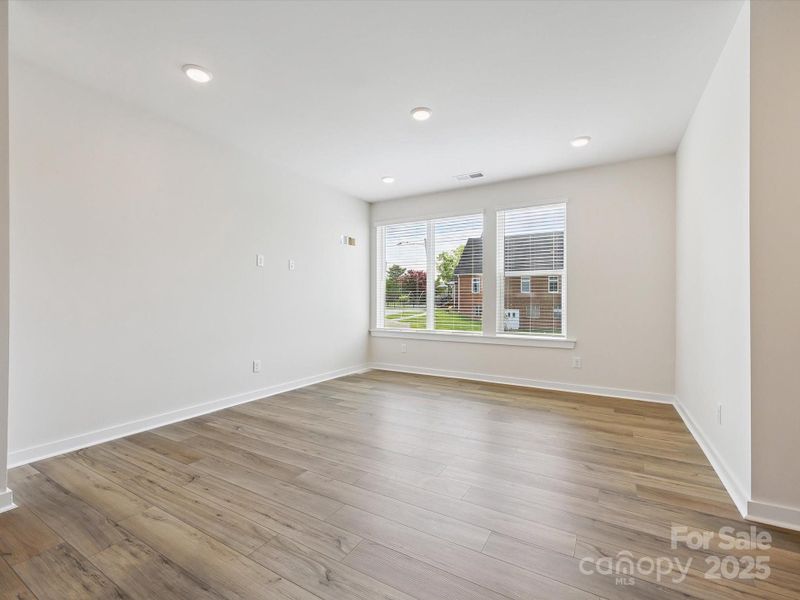 Spacious, unfurnished interior of a new home in Central Living at Craig, Charlotte (Image 26).