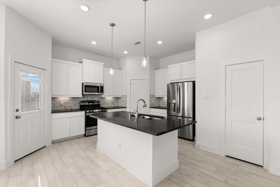 Furnished interior view inside a new home in Meridiana, Manvel (Image 7).