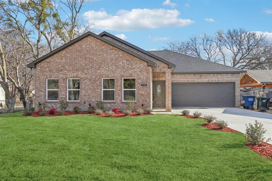 Front exterior of a new home in , Lancaster, TX, highlighting curb appeal (Image 2). Front exterior of a new home in , Lancaster, TX, highlighting curb appeal (Image 2).