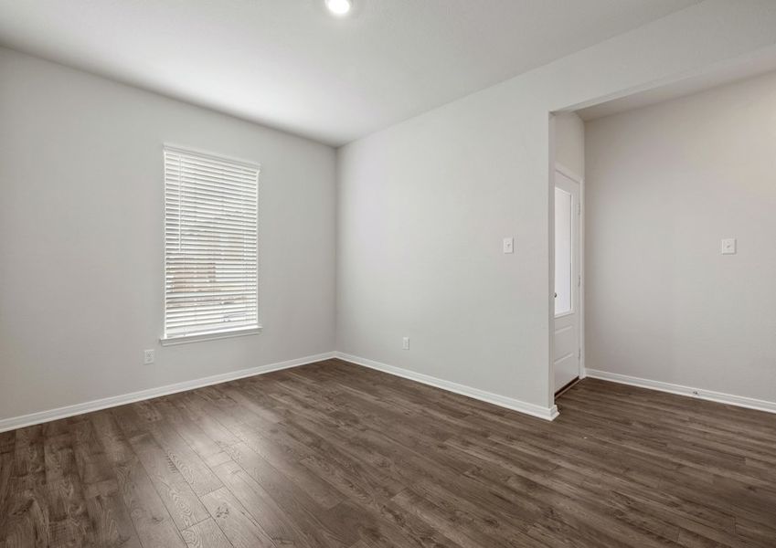 Seperate dining room with a window facing the front yard Seperate dining room with a window facing the front yard