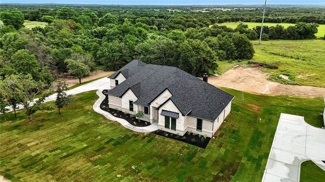 View from above of property featuring a forest