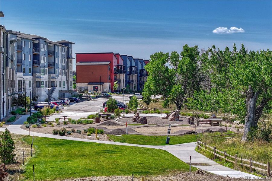 Front exterior of a new home in The Trails at Westcreek, Parker, CO, highlighting curb appeal (Image 21).