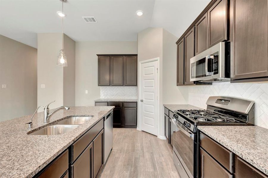 Furnished interior view inside a new home in Woodstone, Providence Village (Image 11). Furnished interior view inside a new home in Woodstone, Providence Village (Image 11).