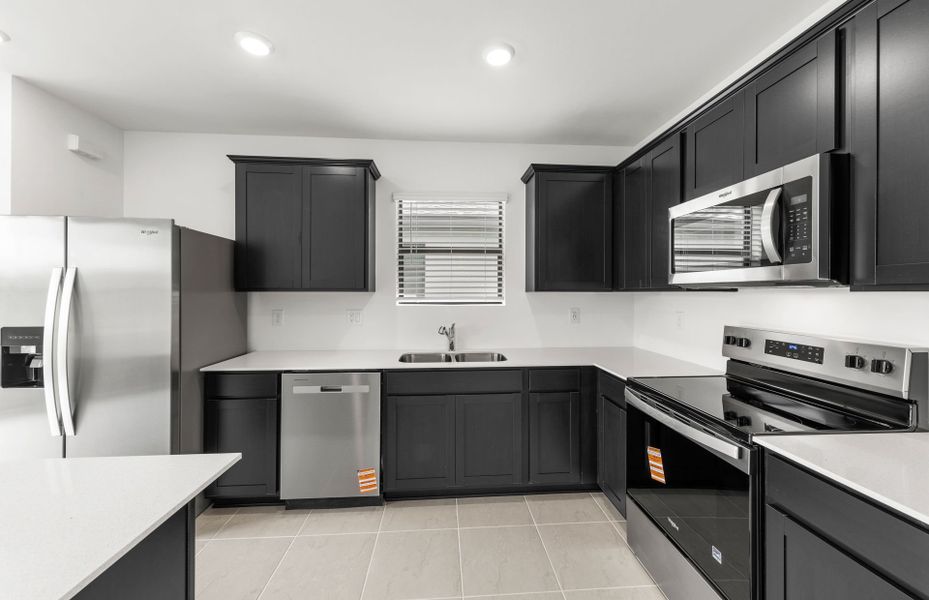 Furnished interior view inside a new home in Caloosa Cove, Labelle (Image 11).