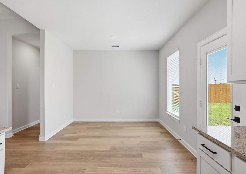 Oak - TX | Dining Room – Rear Door View