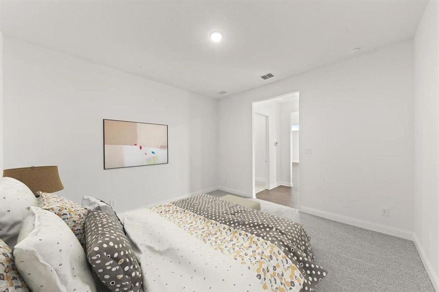 The Brenner A Primary Suite Bedroom
