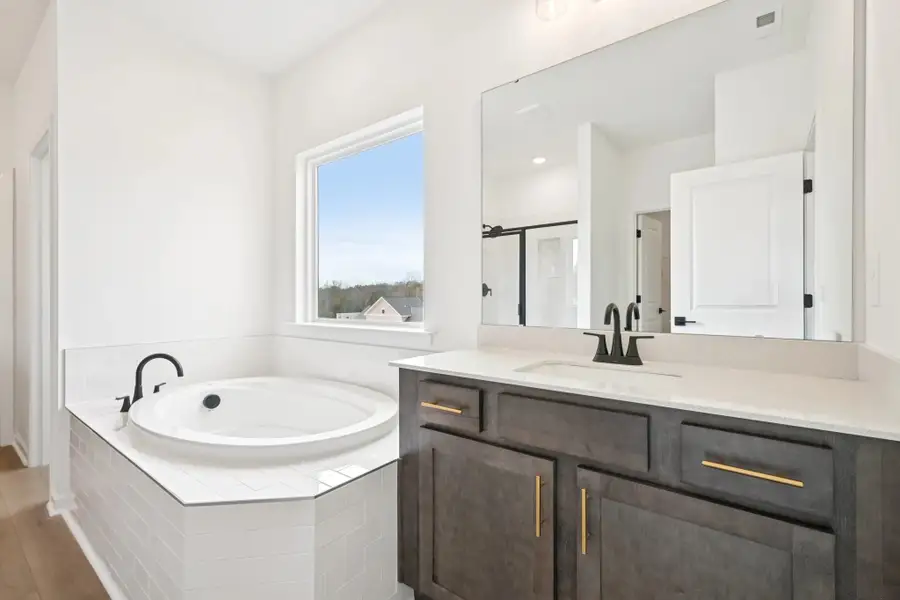 Primary Bath featuring AW Collection® Oxford - Organic textures paired with bold, classic design. Primary Bath featuring AW Collection® Oxford - Organic textures paired with bold, classic design.