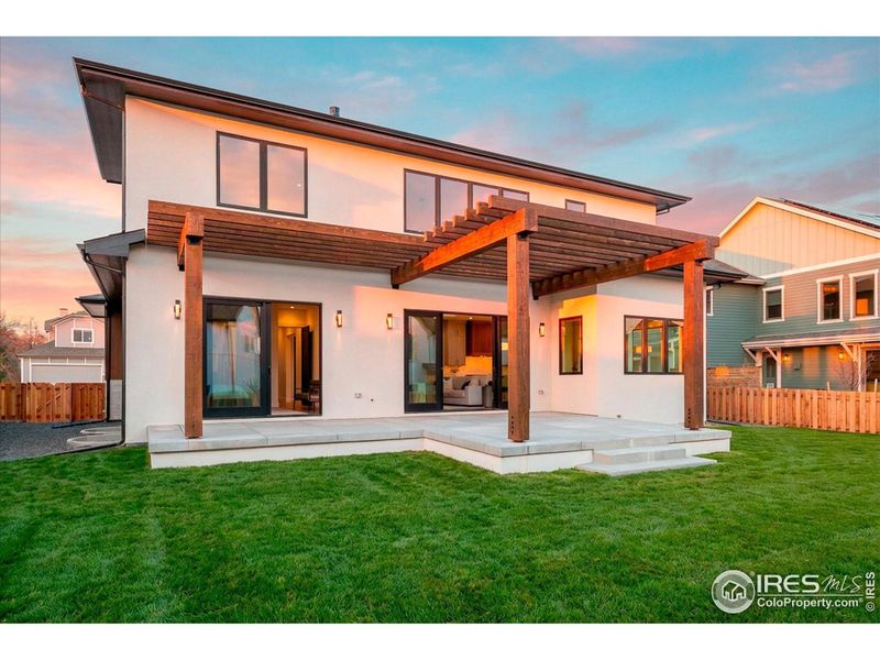 Access to patio from both the Great Room and the Main Floor Primary Suite (virtually added lawn)