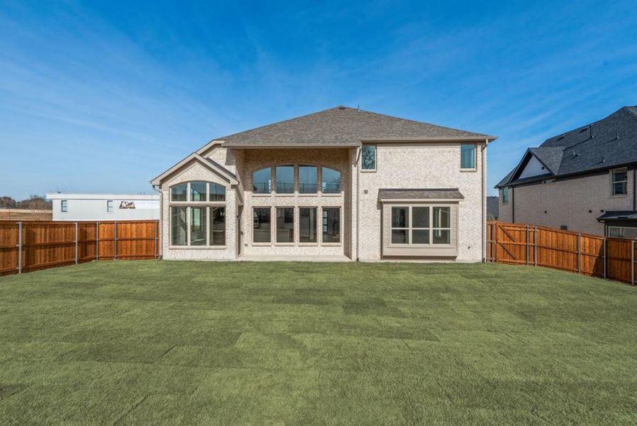 Exterior details and patio area of a home in Chatham Reserve, Providence Village (Image 3).