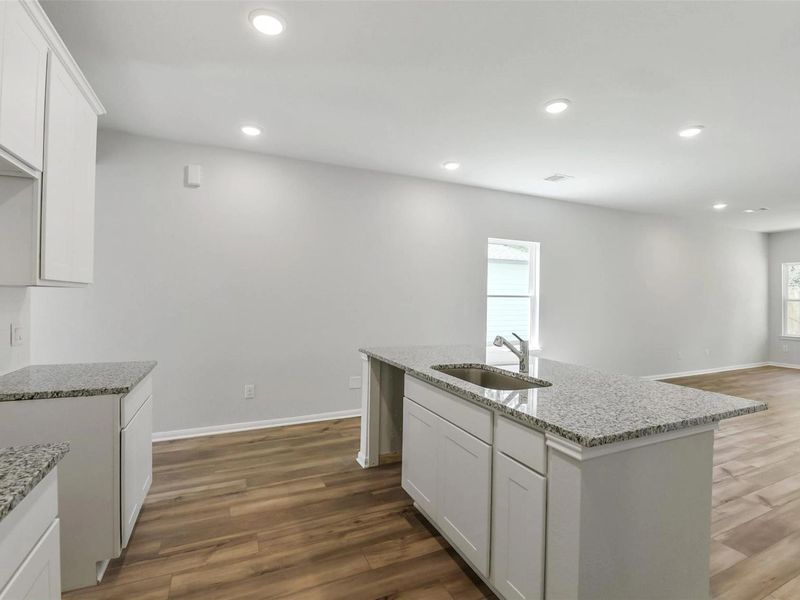 Furnished interior view inside a new home in Caney Creek Place, Conroe (Image 10).