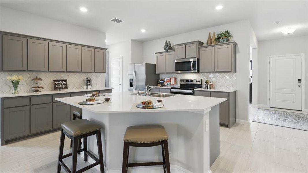 Kitchen - All Home and community information, including pricing, included features, terms, availability and amenities, are subject to change at any time without notice or obligation. All Drawings, pictures, photographs, video, square footages, floor plans, elevations, features, colors and sizes are approximate for illustration purposes only and will vary from the homes as built.