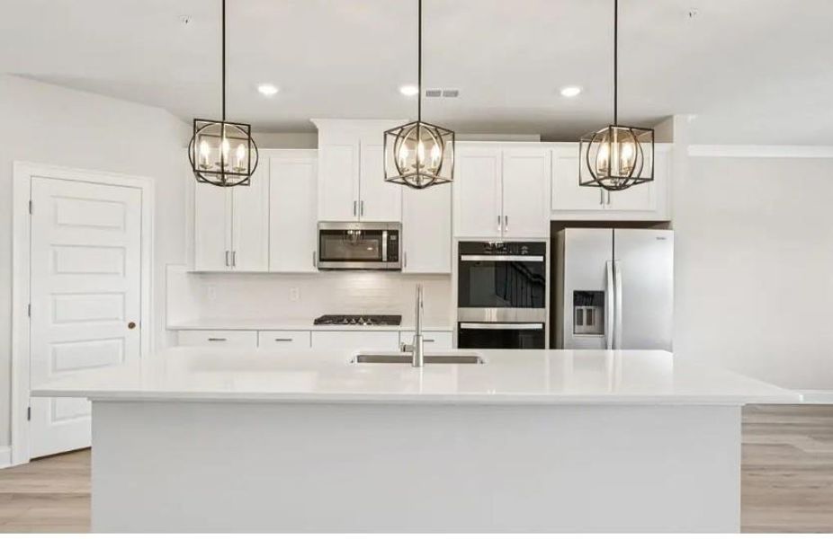 Furnished interior view inside a new home in , Cumming (Image 7). Furnished interior view inside a new home in , Cumming (Image 7).