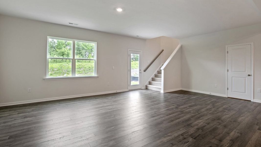 Spacious, unfurnished interior of a new home in The Grove at Matthews Landing, Fuquay Varina (Image 15).