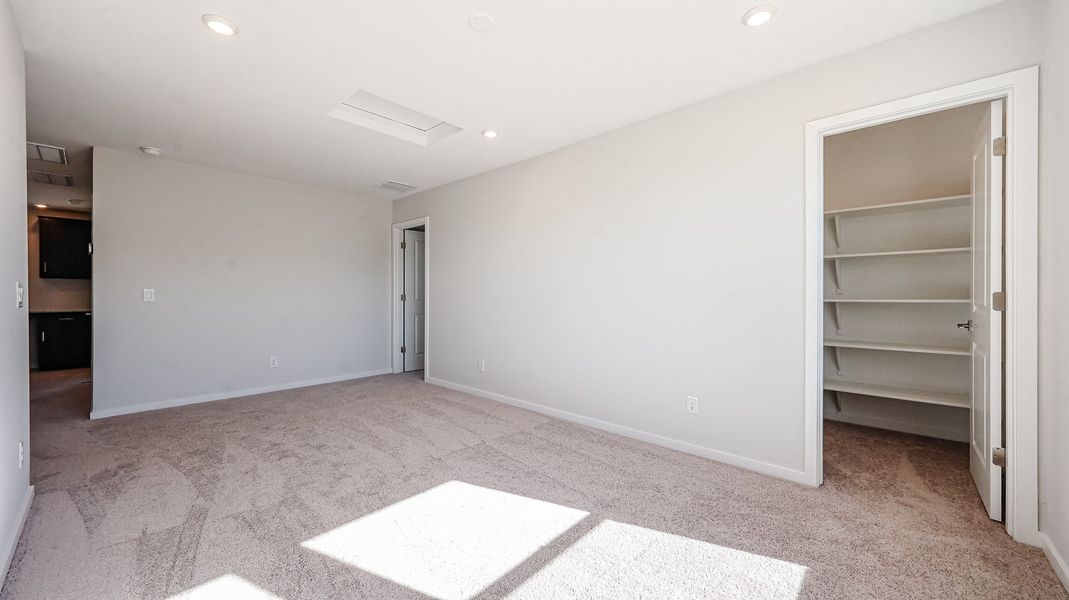 A room with a white wall and a white floor.