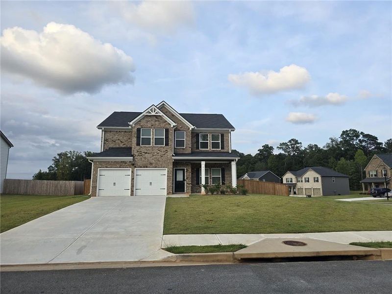 Front exterior of a new home in Fern Dale, Fairburn, GA, highlighting curb appeal (Image 29).