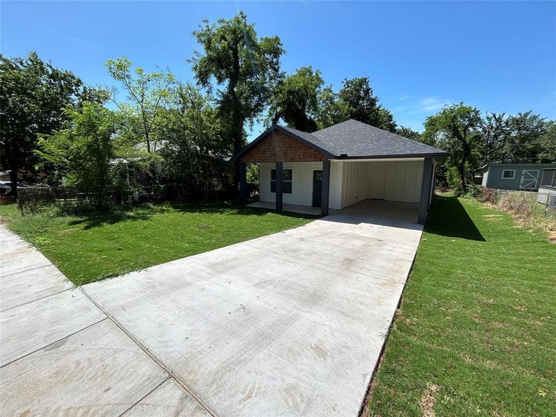 Front exterior of a new home in , Denison, TX, highlighting curb appeal (Image 13). Front exterior of a new home in , Denison, TX, highlighting curb appeal (Image 13).
