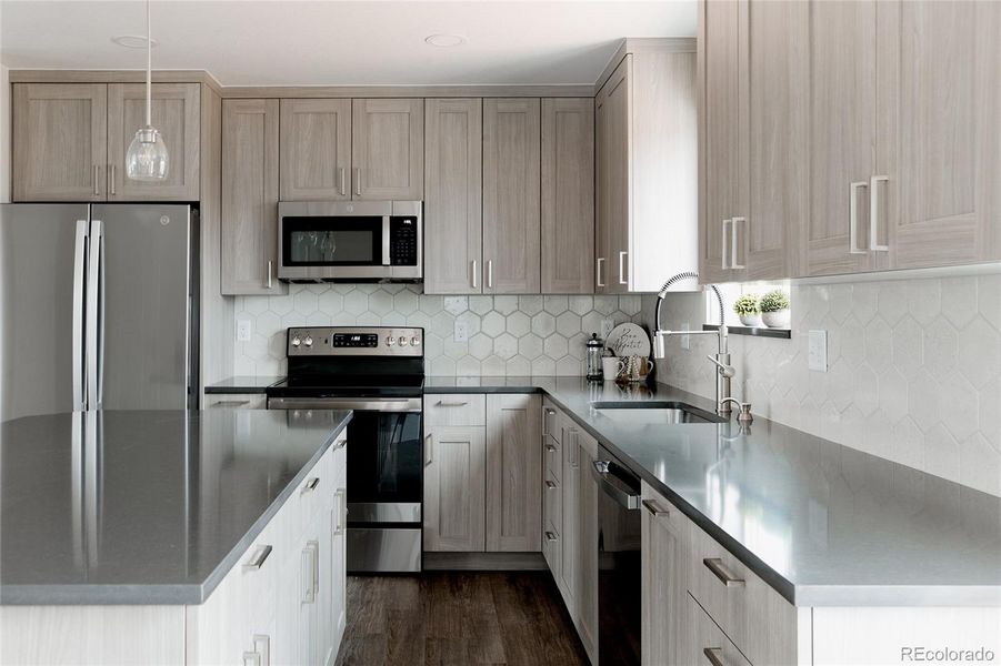 quarts countertops, tile backsplash, soft close cabinets