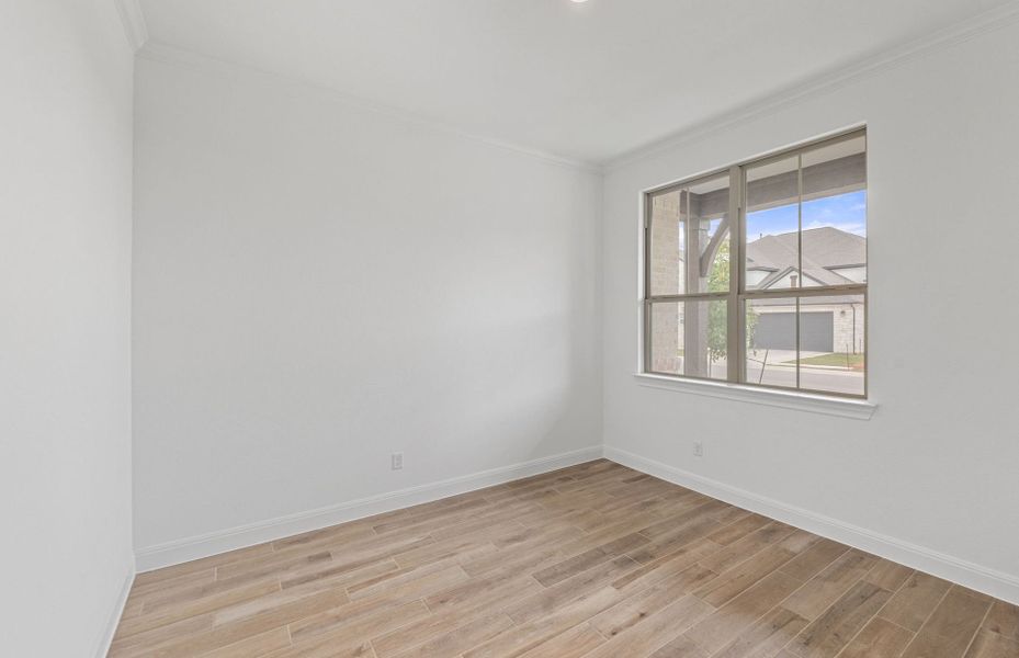Spacious, unfurnished interior of a new home in Bluffview Reserve, Leander (Image 51).