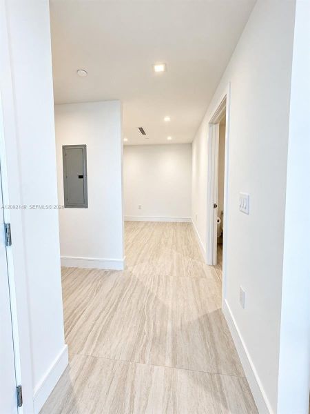 Spacious, unfurnished interior of a new home in , North Miami (Image 14).