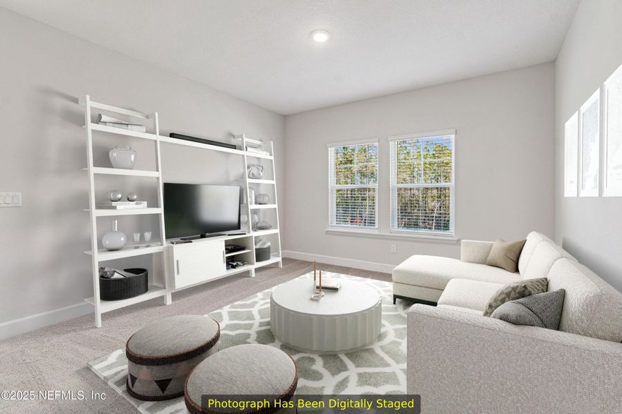 Furnished interior view inside a new home in Tributary 70', Yulee (Image 12).