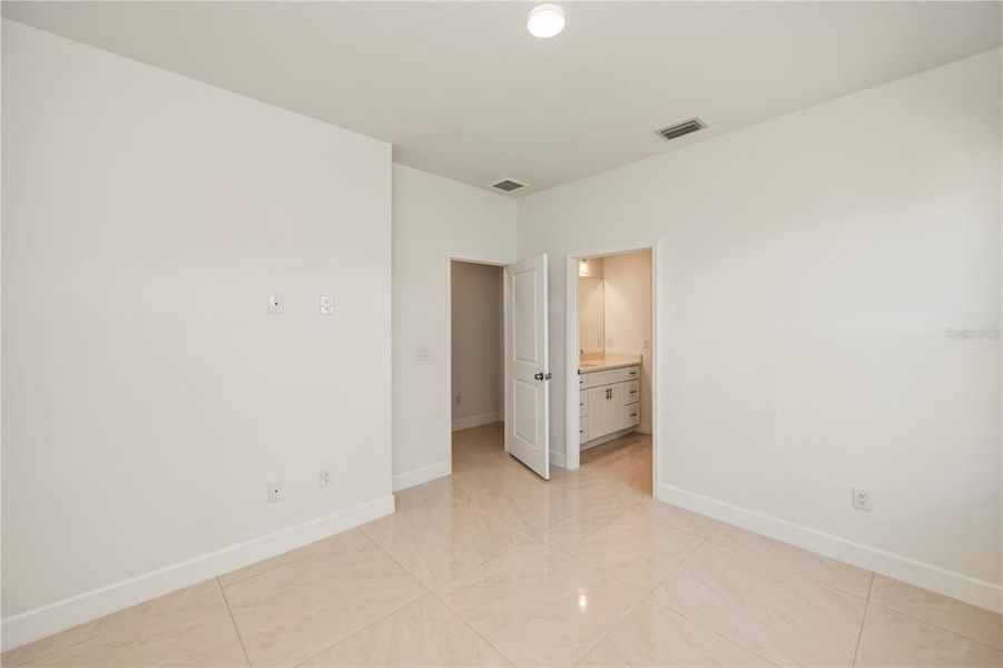 Spacious, unfurnished interior of a new home in , Port Charlotte (Image 42).