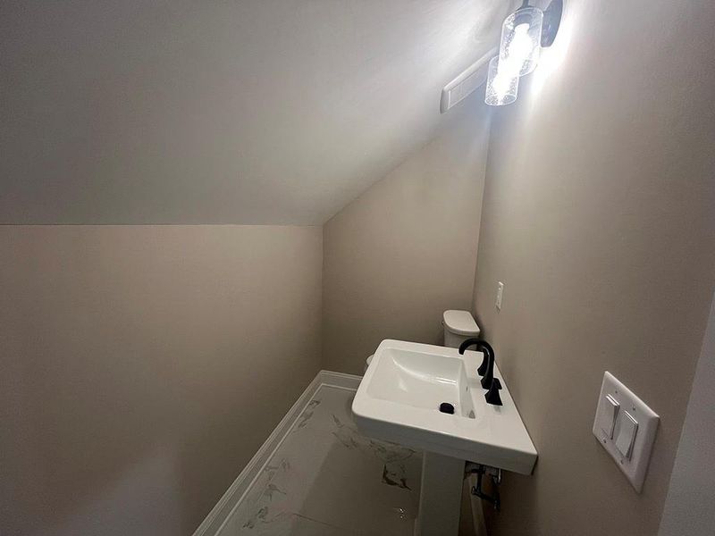 Furnished interior view inside a new home in , White (Image 15).