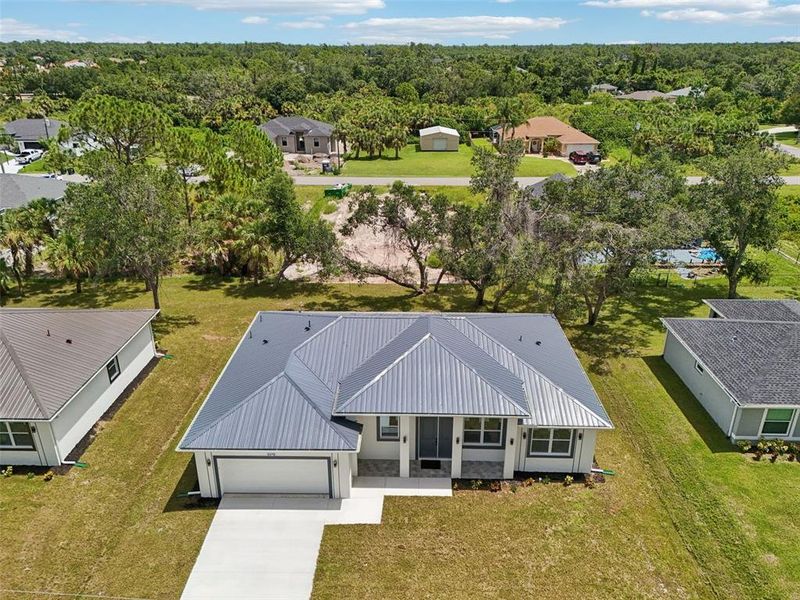 Front exterior of a new home in , North Port, FL, highlighting curb appeal (Image 2).