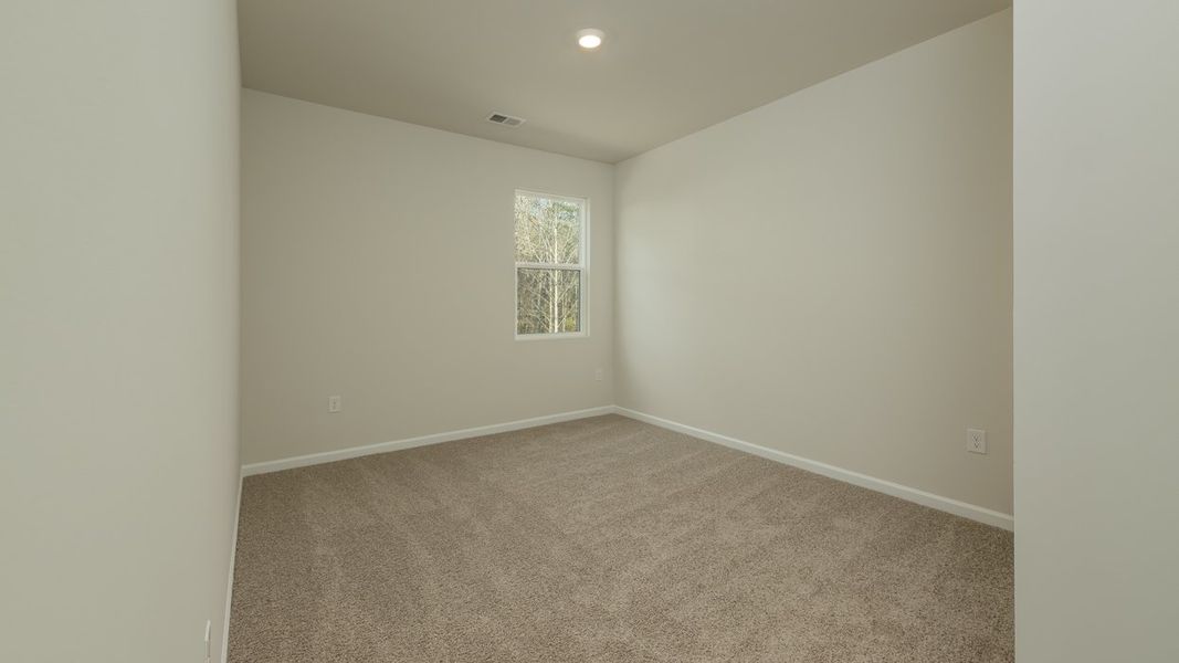 Representative unfurnished interior of a home built from the Mansfield by D.R. Horton in Brooks Station, Dacula (Image 15).