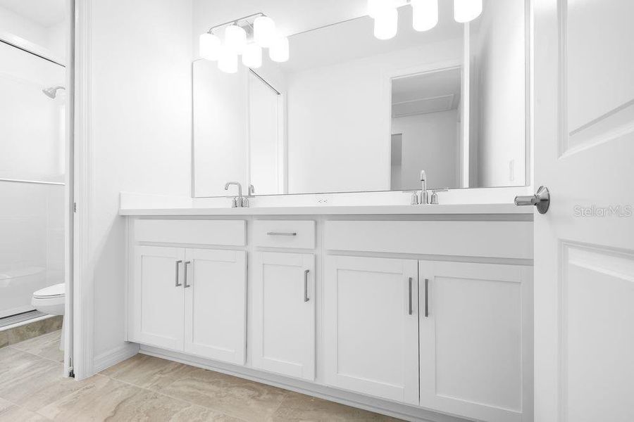 Furnished interior view inside a new home in Ardisia Park, New Smyrna Beach (Image 9).