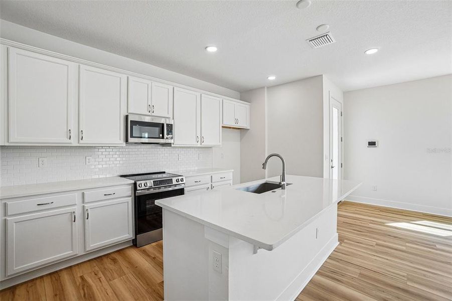 Furnished interior view inside a new home in Lagoon Residences at Epperson, Wesley Chapel (Image 13).