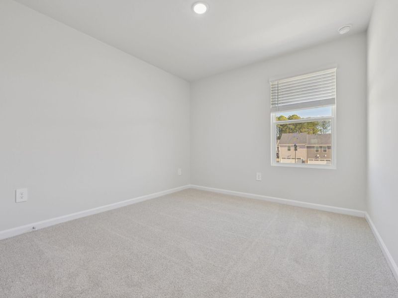 Spacious, unfurnished interior of a new home in The Rows at Buffaloe Reserve, Raleigh (Image 14).