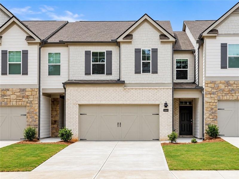 Front exterior of a new home in , Acworth, GA, highlighting curb appeal (Image 1). Front exterior of a new home in , Acworth, GA, highlighting curb appeal (Image 1).